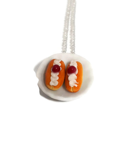Swiss cream buns cakes on a plate necklace