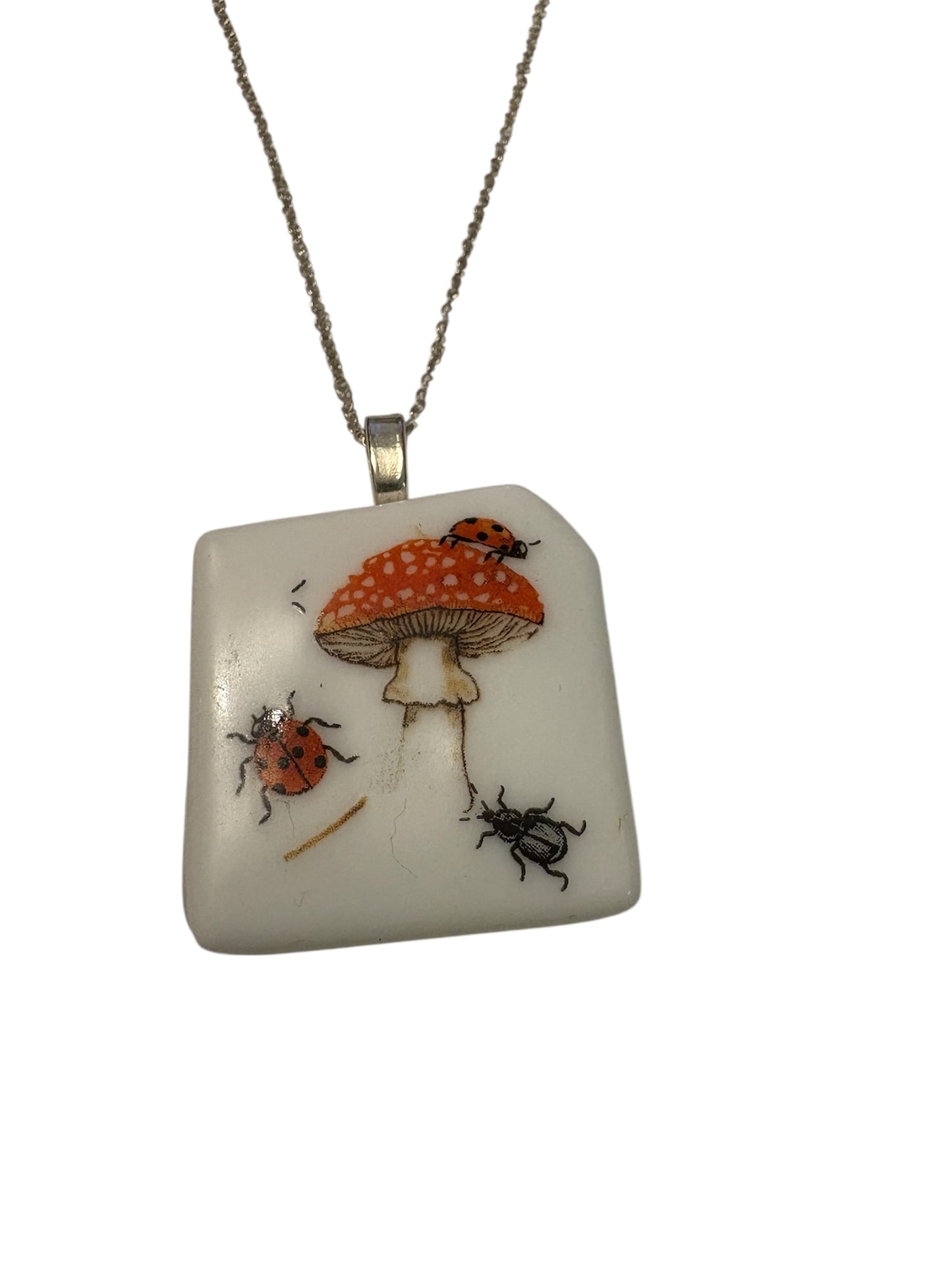 Toadstool and bugs glass necklace